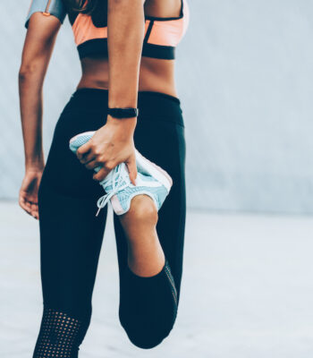 Female athlete Warming up before the workout